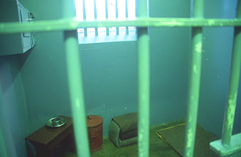 Cape Town Robben Island Nelson Mandelas isolation cell with his artifacts