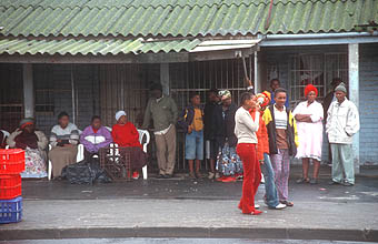 Cape Town Townships people waiting at the bus stop